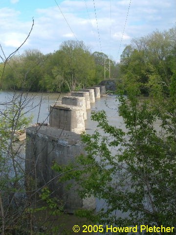 The seven Union Traction bridge piers north of Kienly Island at Logansport, Indiana photographed on May1, 2005.  Howard Pletcher