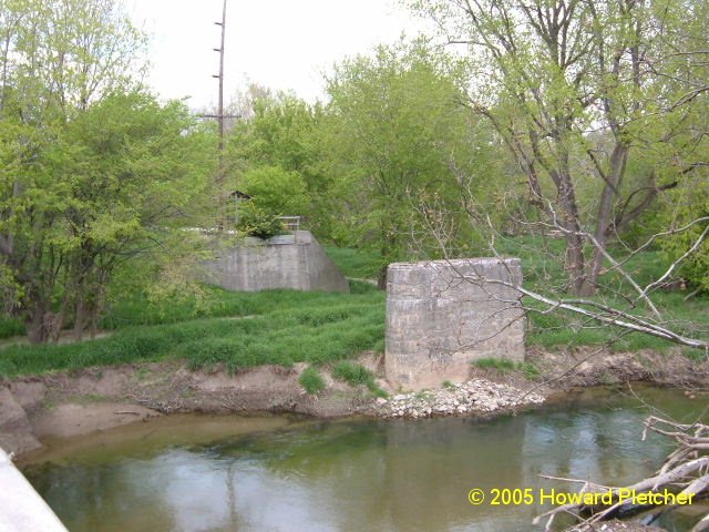 Abutments and pier in Deer Creek at Delphi carried Ft, Wayne & Wabash Valley line.  This spot can be reached from the north side via a hiking trail on the right-of-way.  Howard Pletcher