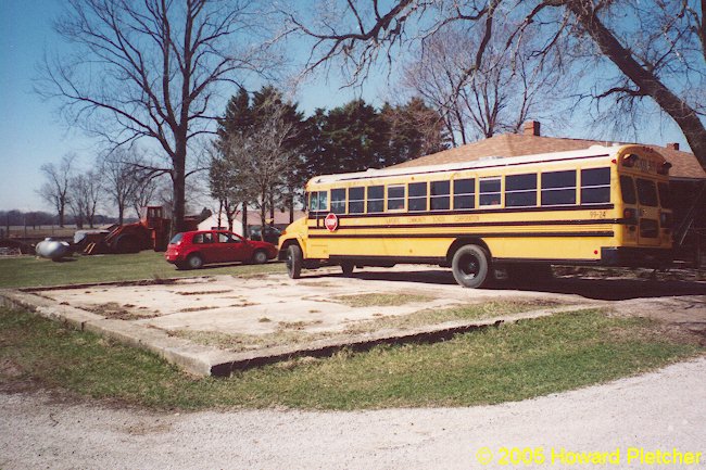 The foundation of the Wilkinson substation now serves as school bus parking.  Howard Pletcher