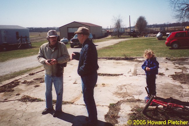 The gentleman in the center is the current owner of the property on which the Wilkinson Station and substation remains are located. The pole barn beyond him in the center of the photo sits directly on the Air Line right-of-way. © Howard Pletcher