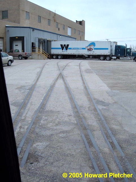 The Winona Railroad had a small yard here in Warsaw that served Litchfield Dairy and these tracks remain in the concrete behind Warsaw Chemical.  Howard Pletcher